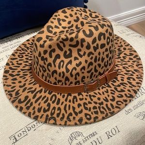 Rich chestnut cheetah stylish hat with leather band.